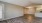 a room with a wood floor and a wood floor